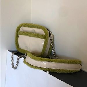 Green and beige purse on a chain